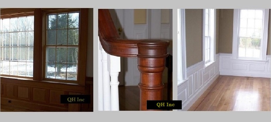 Custom balustrade hand-rail and newel posts.  Custom raised-panel wainscot.  Corbels.